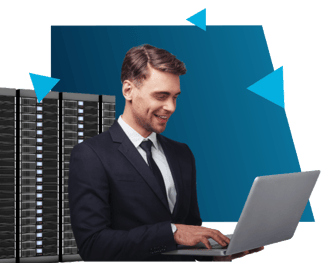 man in front of servers and laptop man in front of servers and laptop